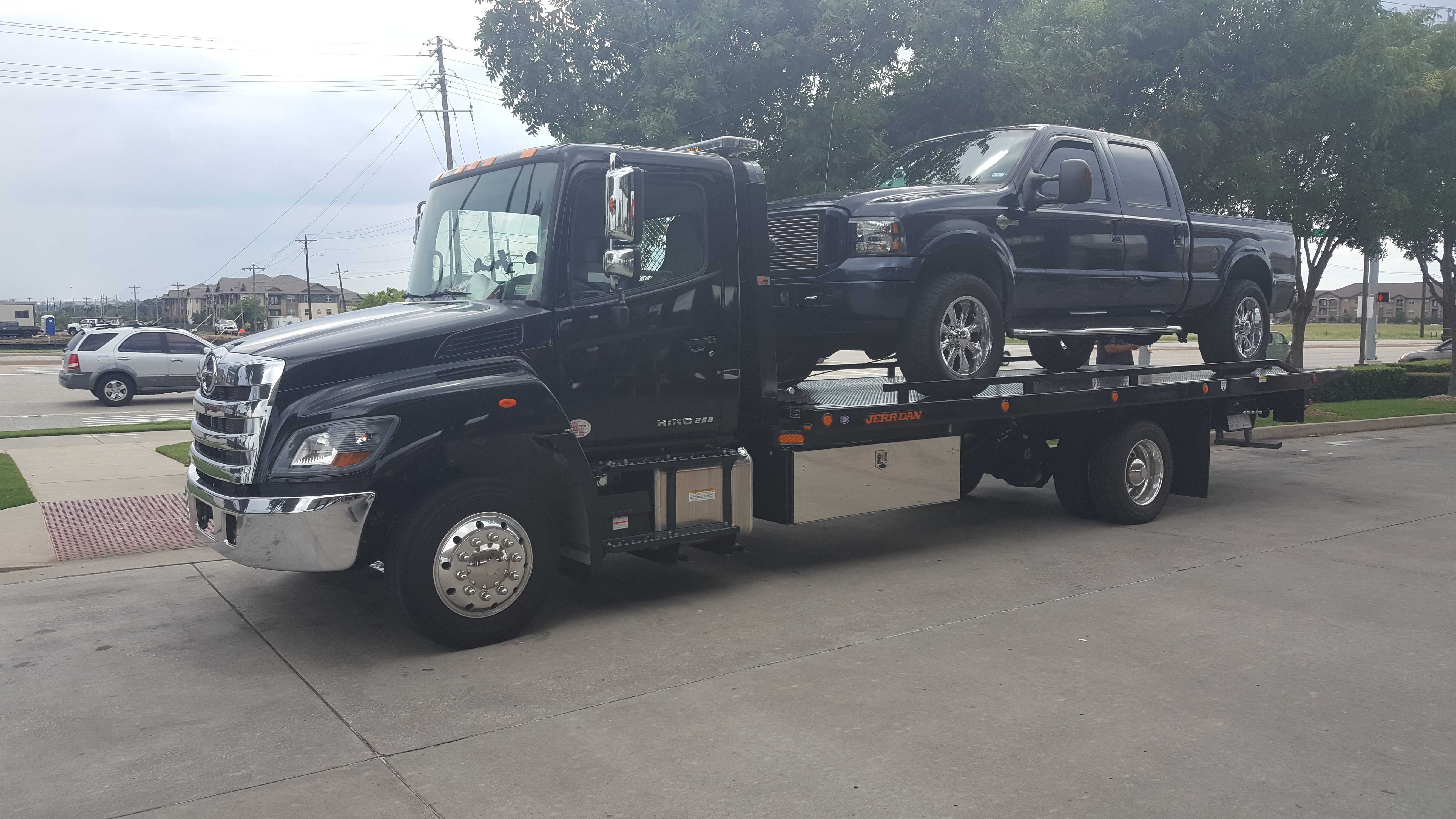 Flatbed Tow Truck In Dallas business image in Dallas, TX